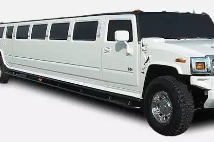 Power meets luxury in this 18 Passenger H2 Hummer Super Stretch Limousine.  Common in many weddings, this vehicle has all the bells and whistles to make your wedding a joyful one.  From 2 bar areas to a 2000 Watt Sound System to audio hookups!  Call us for more info!
