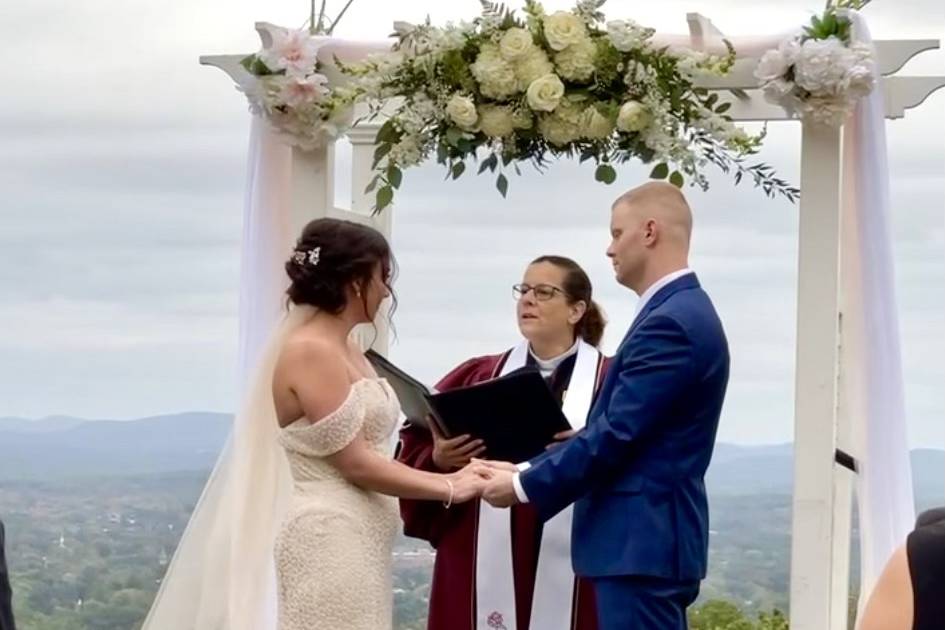 Under the ceremony arch