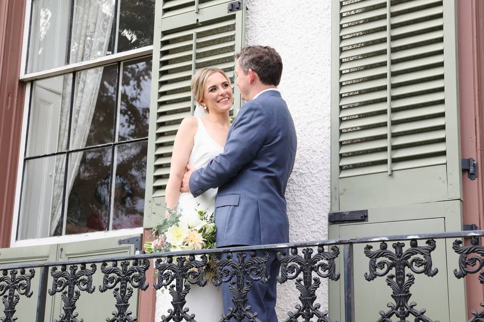 Bride and Groom on Balcony