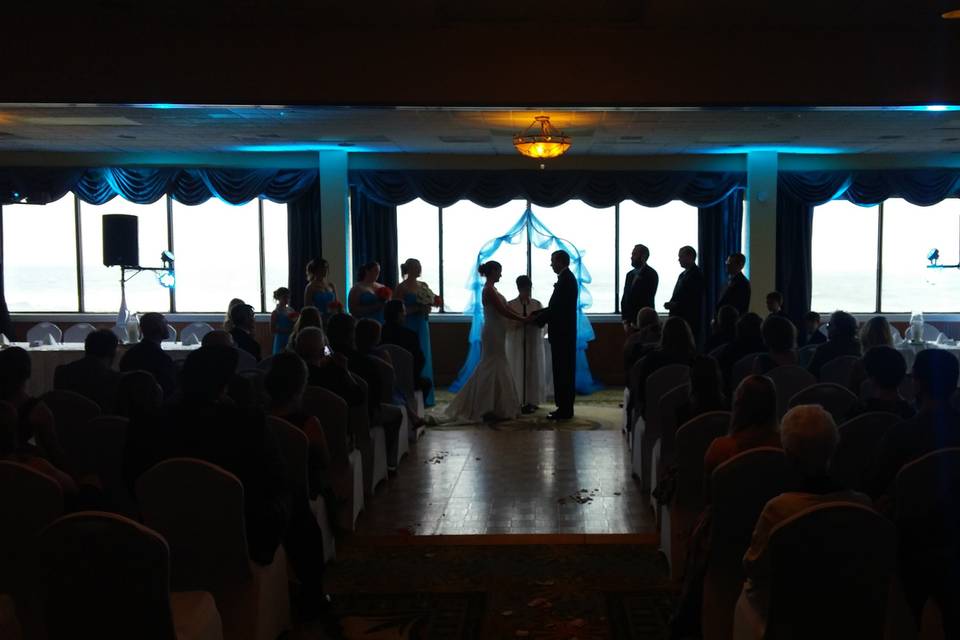 Great use of uplighting for an indoor ceremony.
