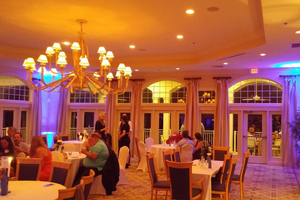 Corner uplighting to help transfer an ordinary (although elegant) room into a custom creation reflecting the theme of the wedding. The LED par lights used can project neary any color imaginable.