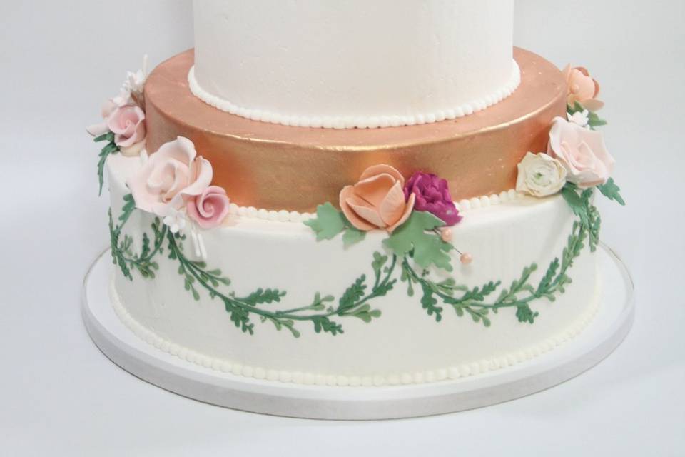 Wedding cake with flowers and leaves