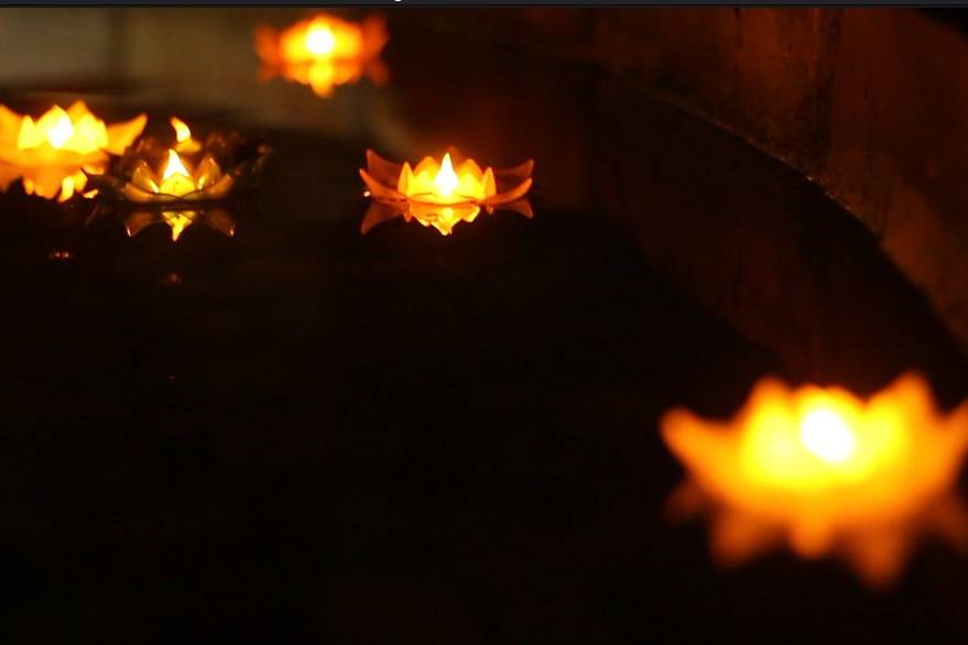 Flower candles in water