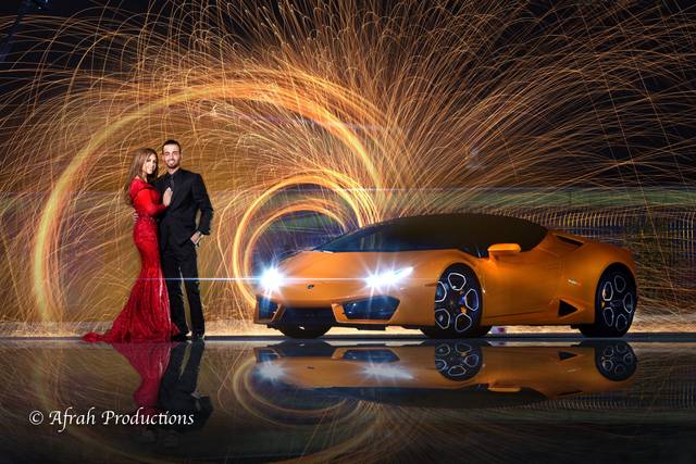 Red gown, orange sports car