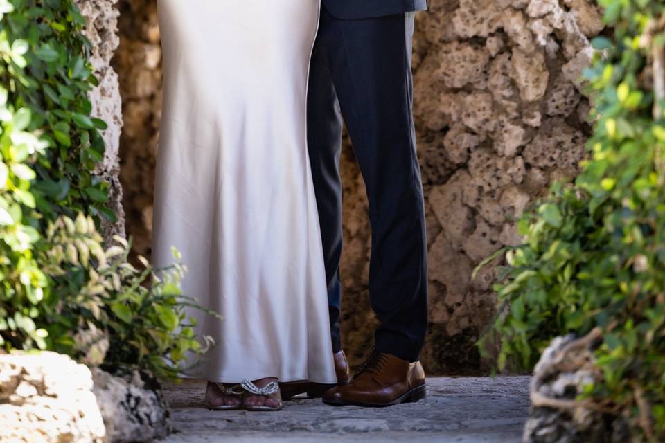 Satin dress in a stone grotto