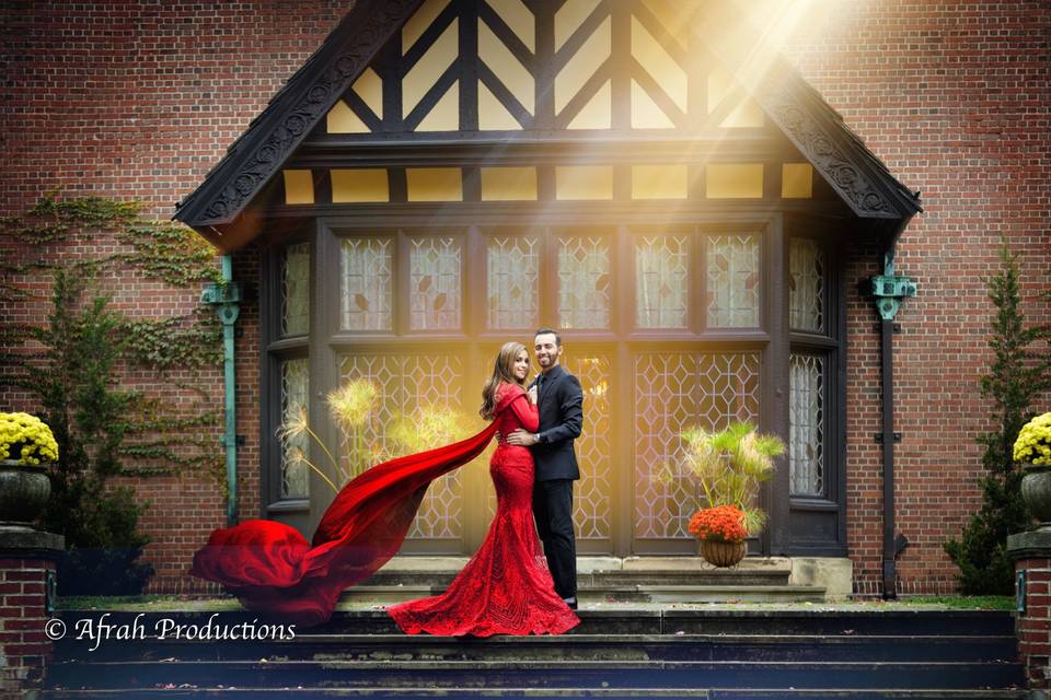 Red gown on Tudor steps