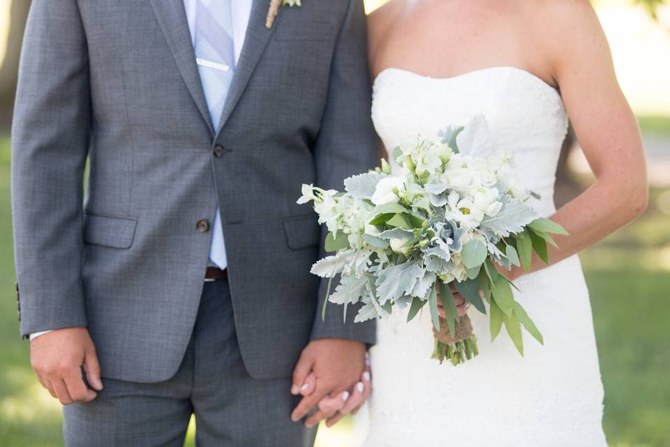 Minty Frost Florals featuring Dusty Miller, Mint Delphinium, White Spray Roses, White Freesia, White Lisianthus, Silver Dollar & Willow Eucalyptus Photo Credits: Marissa Eileen Photography