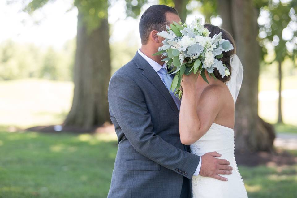 Minty frost florals featuring dusty miller, mint delphinium, white spray roses, white freesia, white lisianthus, silver dollar & willow eucalyptus photo credits: marissa eileen photography