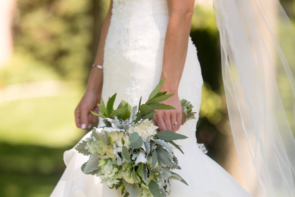 Freesia, lisianthus, mint delphinium, majolika spray roses, willow an silver dollar eucalyptus and dusty miller