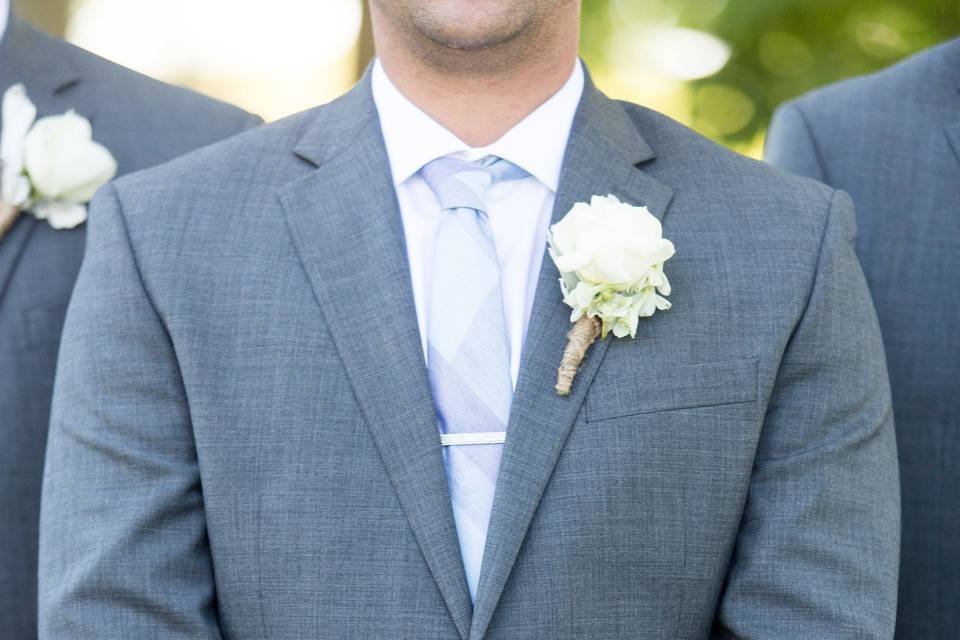 Lisianthus mint delphinand dusty miller boutonnière