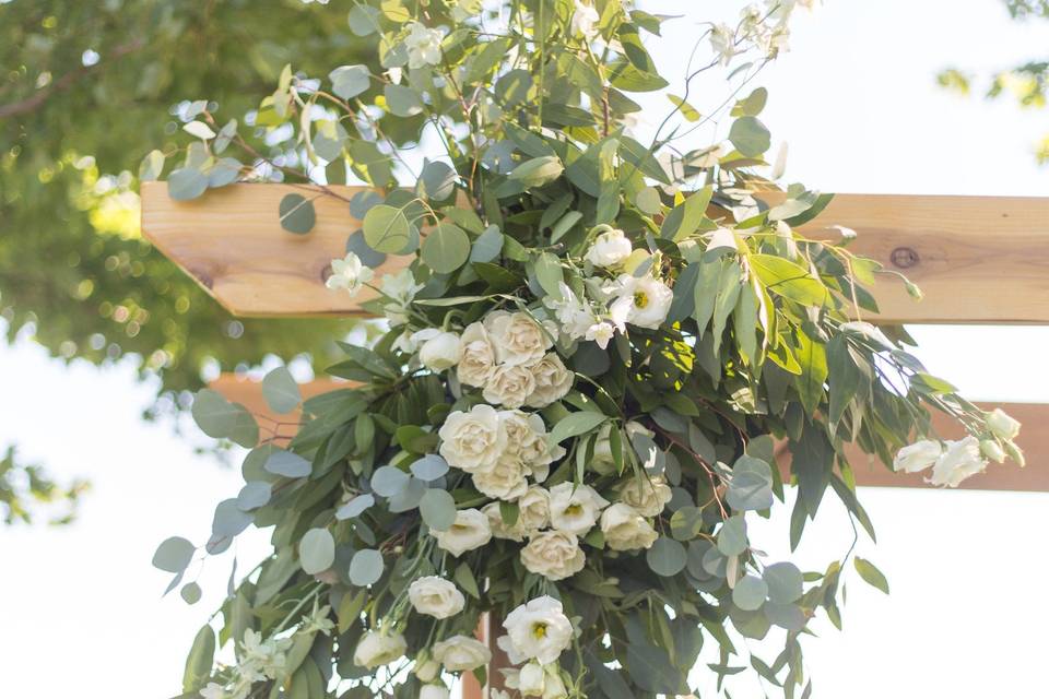 Minty Frost Florals featuring Dusty Miller, Mint Delphinium, White Spray Roses, White Freesia, White Lisianthus, Silver Dollar & Willow Eucalyptus Photo Credits: Marissa Eileen Photography