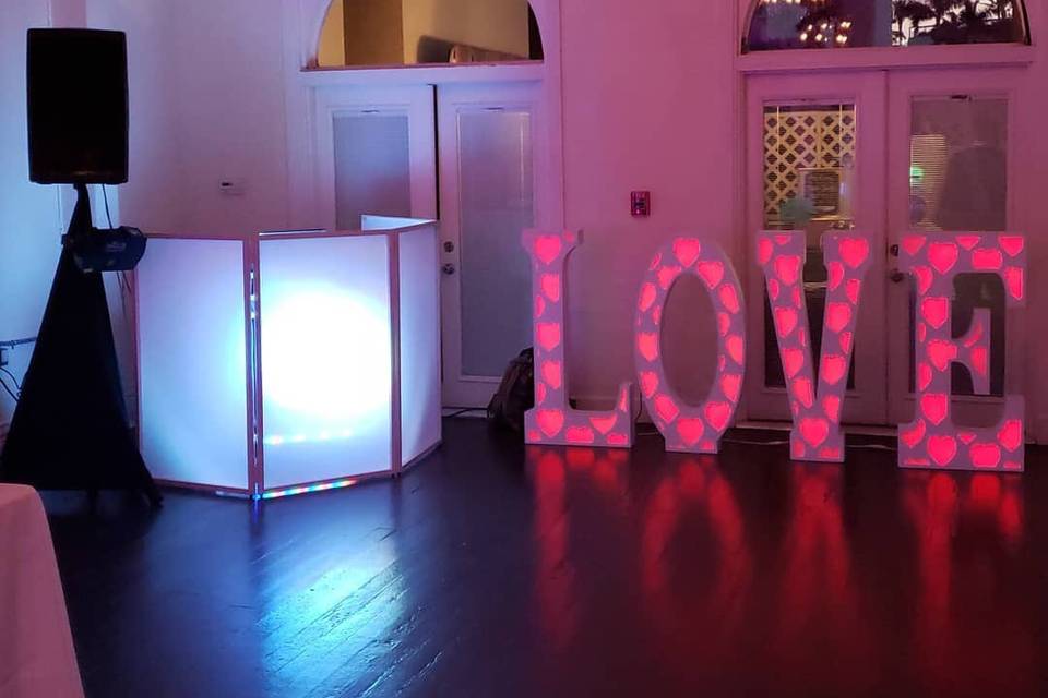 DJ booth with love sign