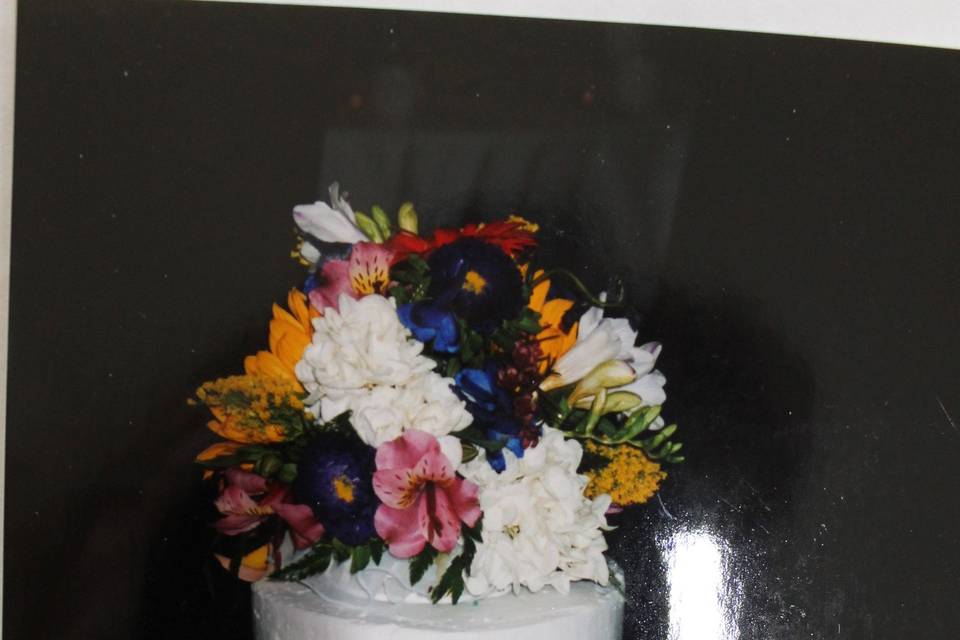 Wedding cake topped with flowers