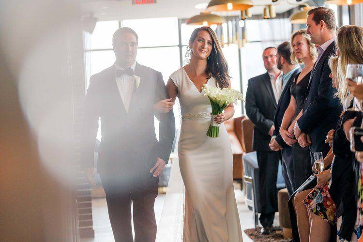 A bride walking on the aisle (the Skylark, NY).