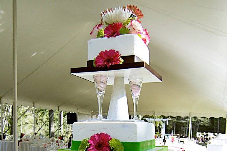 Martini Glass, fondant ribbon, fresh flowers. Red Velvet Cake, Bluberry Jam ribbon, White Chocolate Cream Cheese frosting.