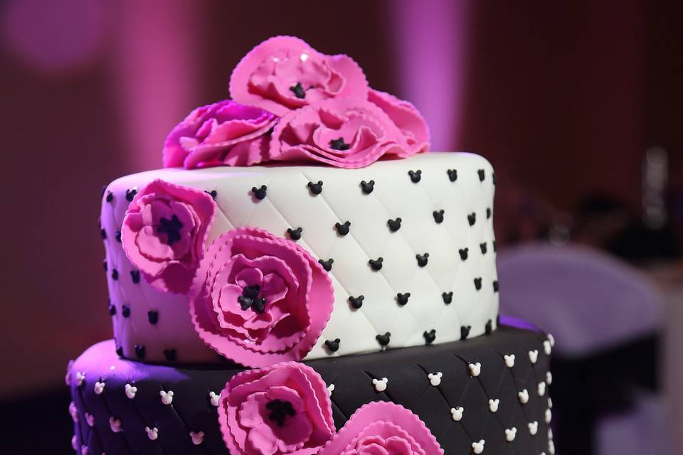 Quilted Mickey Dots Wedding Cake: Bottom tier is Gluten Free Golden Ale Cake, mini chip layer, Hazelnut Liqueur Buttercream filling. Middle and top tiers are Gluten Free Root Beer Cake with Vanilla Buttercream filling. Fondant frosting and flowers. Photo by Kristin Griffin Photography, http://kristingriffinphotography.com.