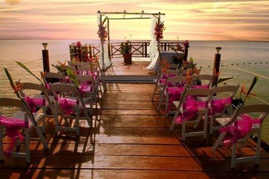 Boardwalk ceremony setup at sunset