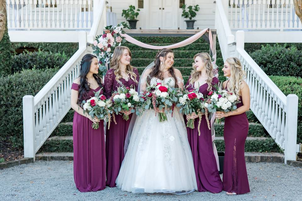 Bridal party by stairs