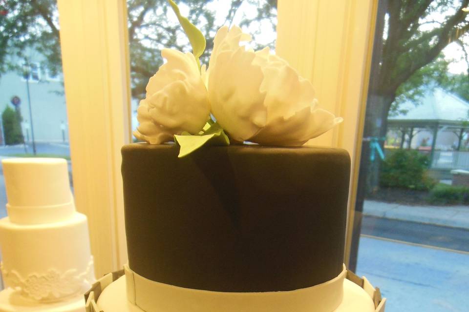 A modern black and white wedding cake