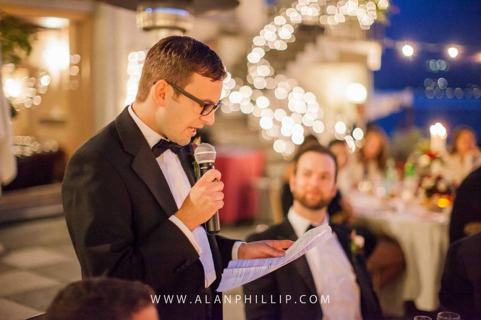 Look how the fairy lights create a smooth warm background, here during a toast on an Italian Lake venue. Image courtesy Alan Phillip Usa