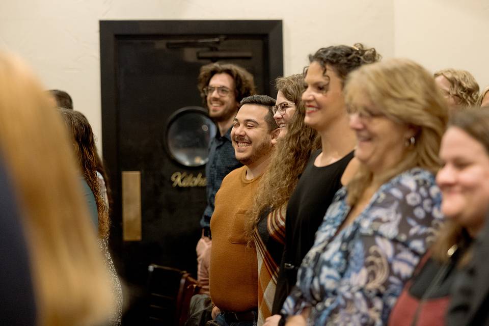 Guests laughing during ceremon