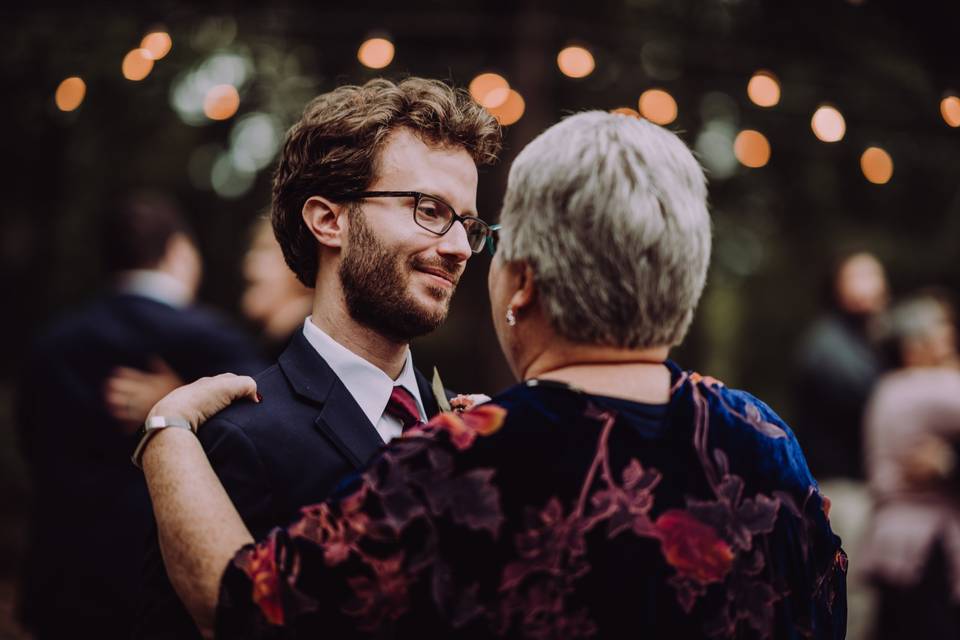 Mother and son dances