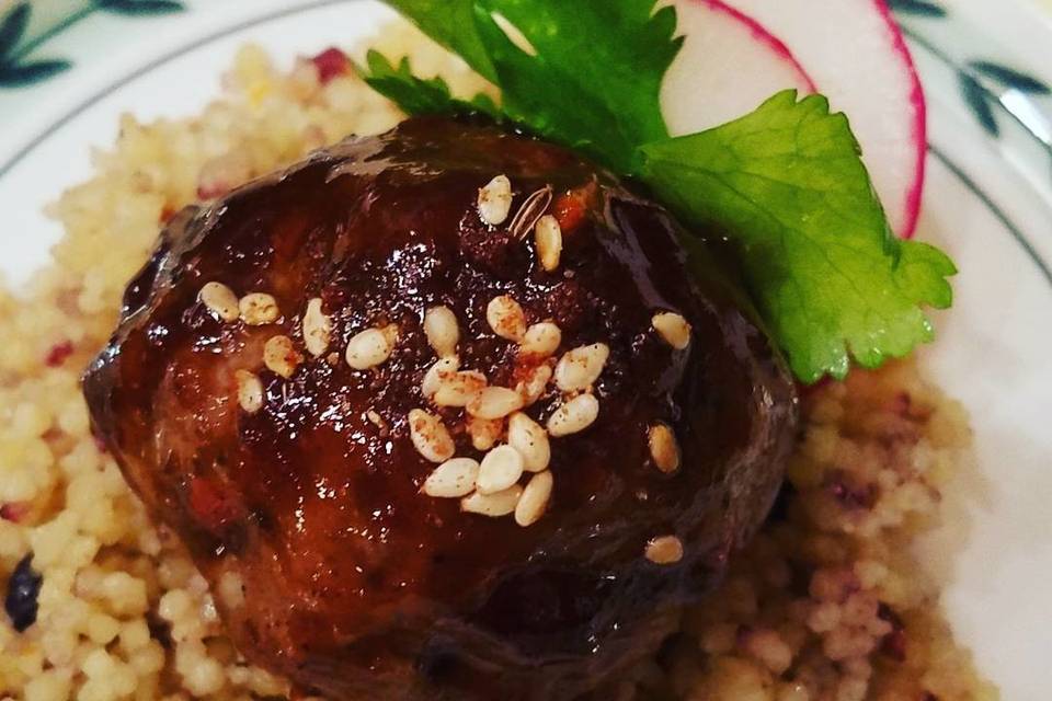 Lamb meatball with tamarind glaze on couscous