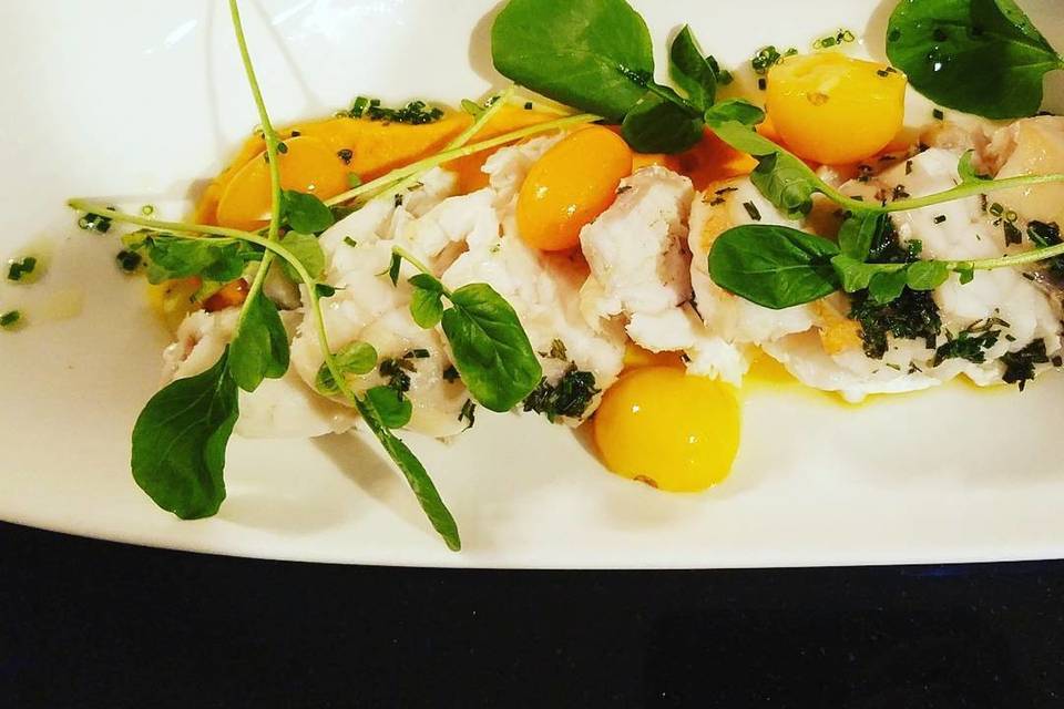 Roasted Monk Fish with Herb Butter on Saffron Carrot Puree. This was for a Family-Style service.