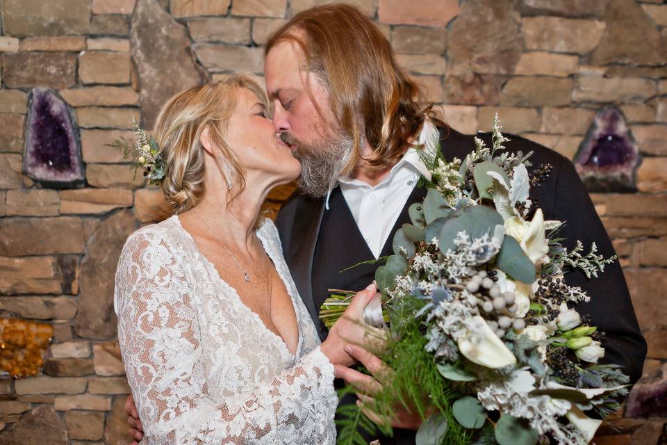 Bride and groom kissing