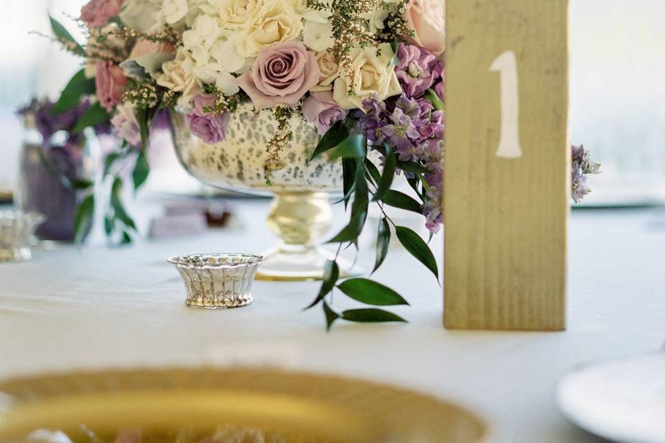 Table number and floral arrangement