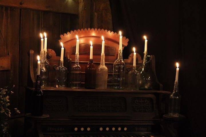 Organ lit with candles