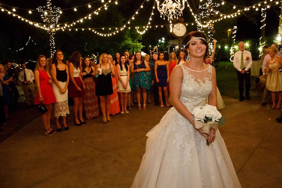 Bride throwing the bouquet