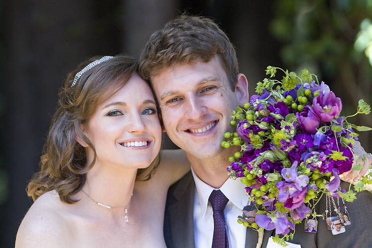 Smiling bride and groom