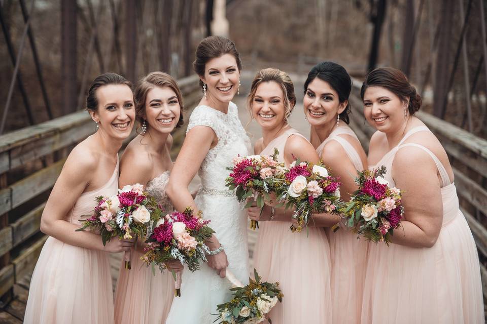 Bride and bridesmaids with their flowers