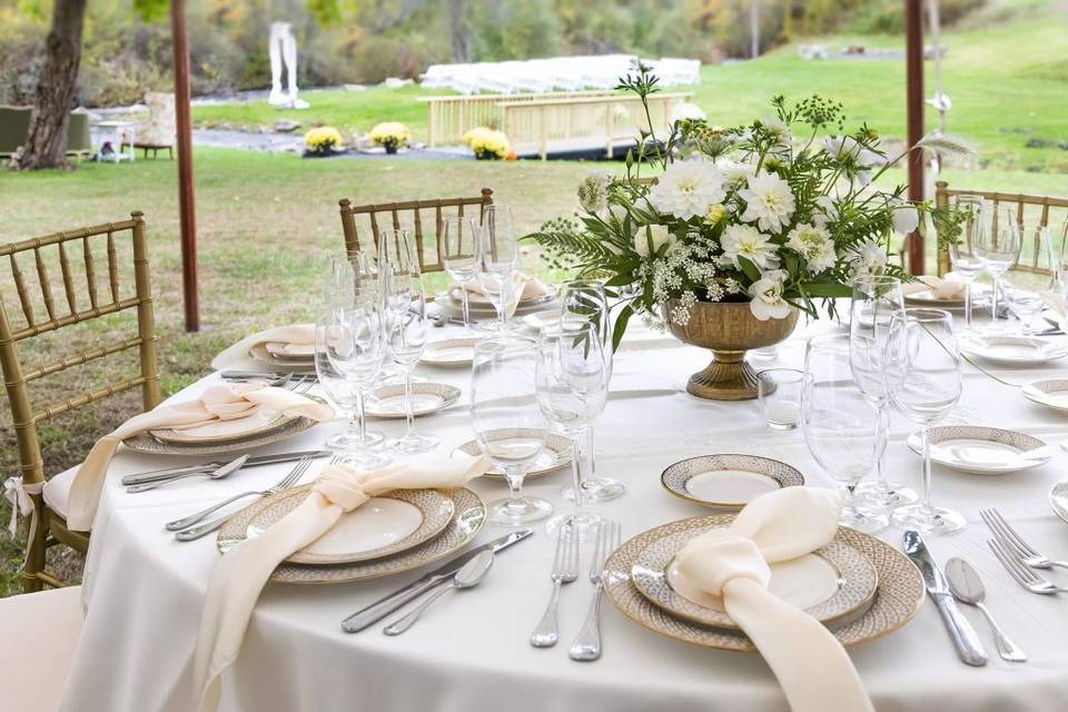 Table with white floral arrangement