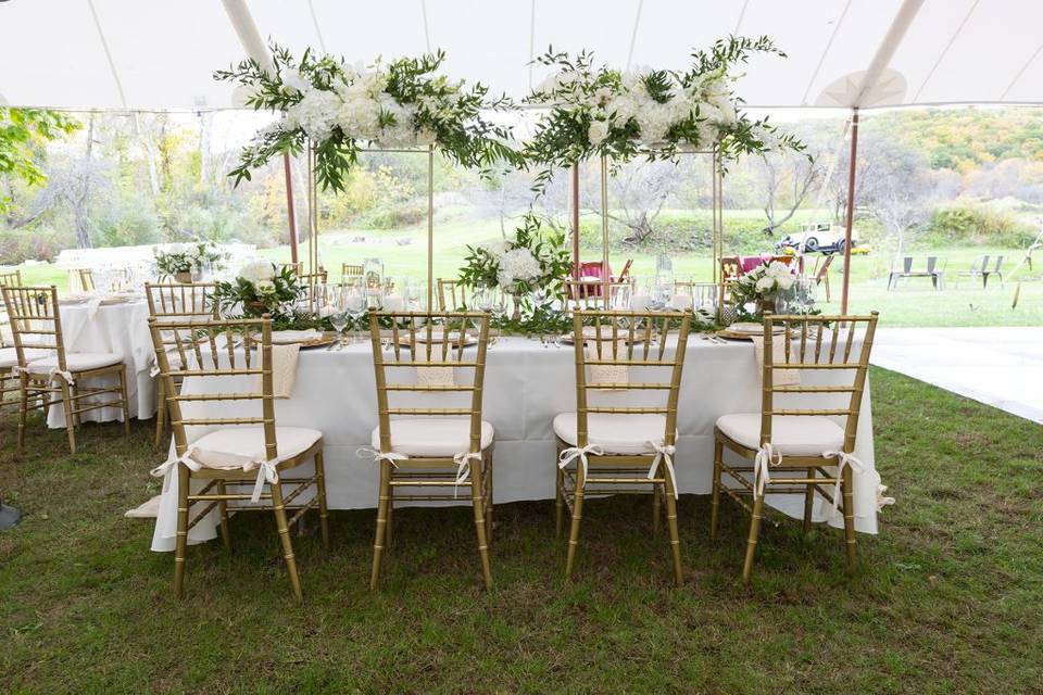 Long table with floral arrangements