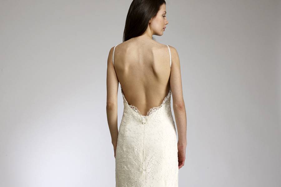 BrielleFluted backless gown of lace & silk charmeuse with beaded hemline.