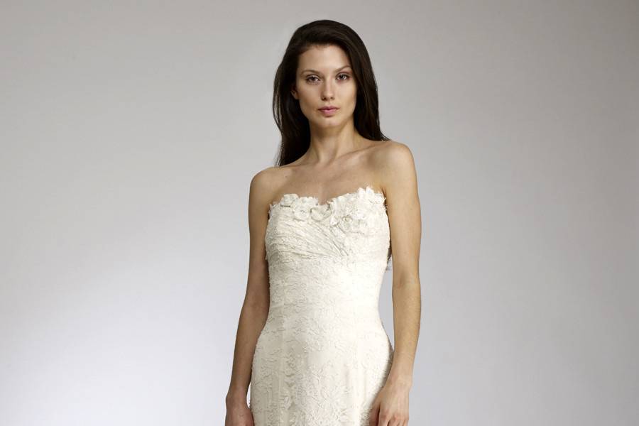 InkaFlared column gown of Chantilly Lace with draped empire neckline and beaded scalloped train.