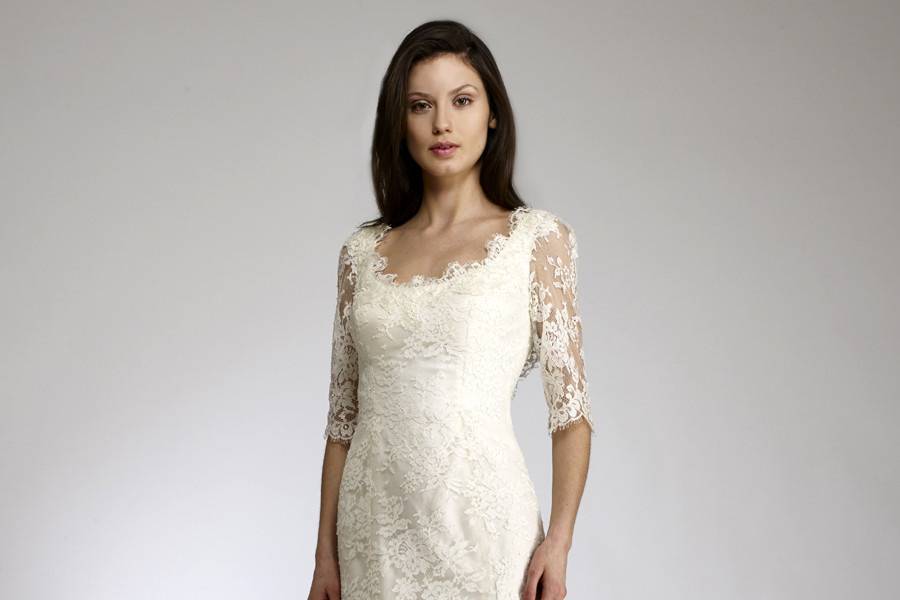 LanaScoop neck lace gown with three quarter sleeves.