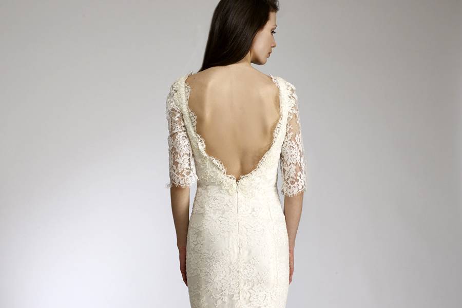 LanaScoop neck lace gown with three quarter sleeves.