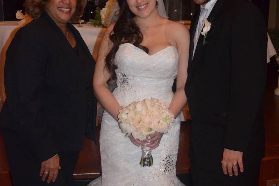 Newlyweds and the officiant