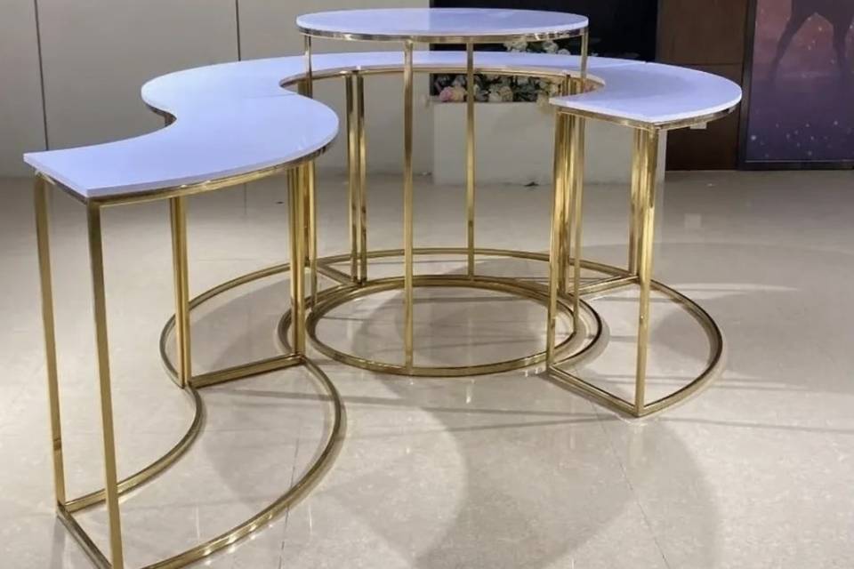 Spacial  Serpentine Tables