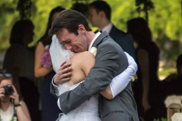 The bride and groom sharing an emotional moment just after the ceremony!