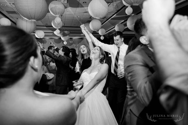 The couple and their guests dancing