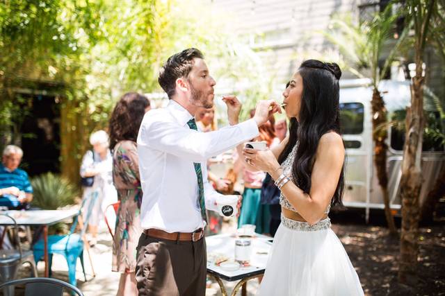 Newlyweds sharing their cups of gelato