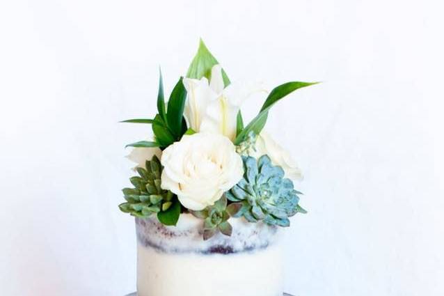 Three tier wedding cake with succulents