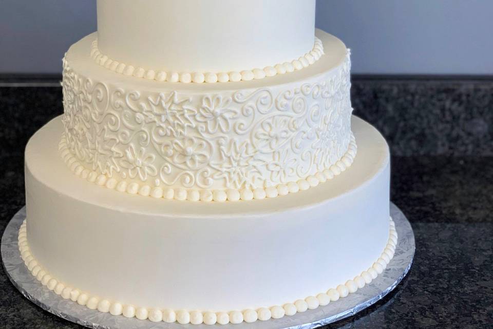 White Four Tier Wedding Cake