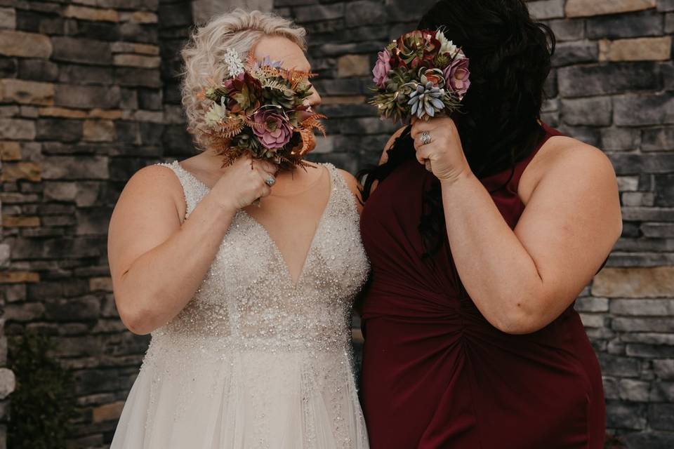 Holding their bouquets - Prime Legacy Photography