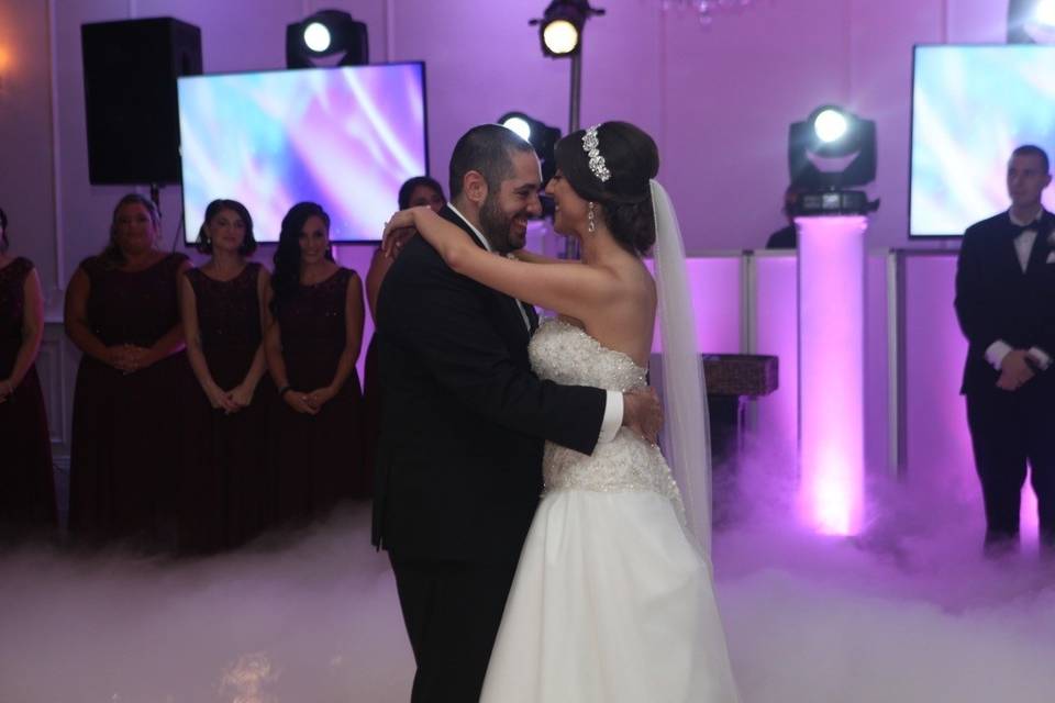 Couple's first dance on clouds