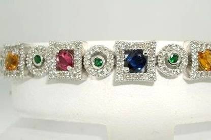 14kt White Gold Multi Colored 100% Natural Saphires & Diamond Bracelet.
Shop: www.diamondsbyjanet.biz